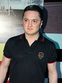 Shri Gautam Singhania